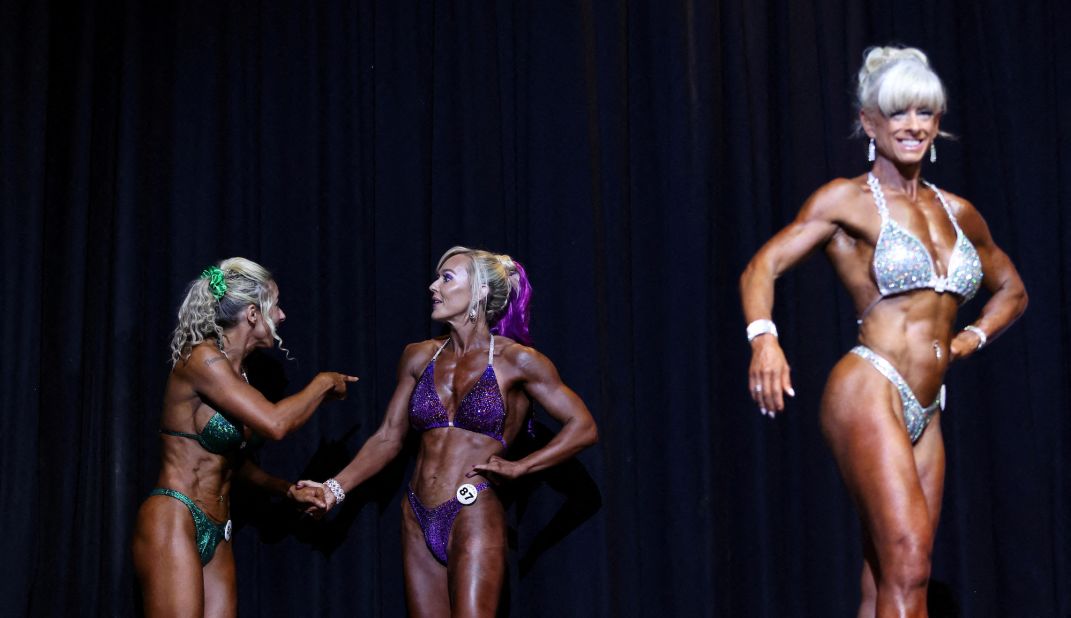 Bodybuilders compete during the Miss United Kingdom contest in Gateshead, England, on Sunday, October 23.
