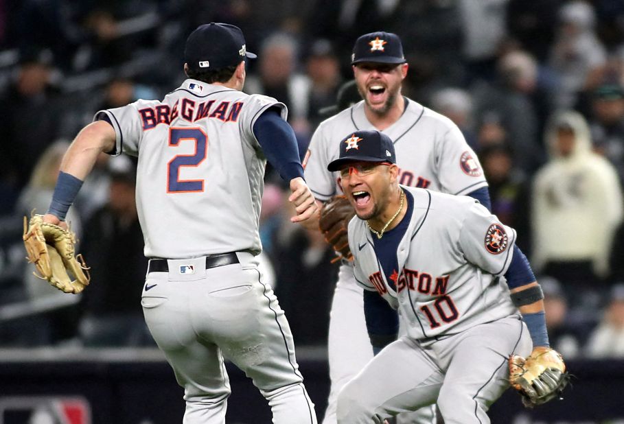 Houston Astros celebrate Sunday, October 23, after they swept the New York Yankees to win the American League and head to the World Series.