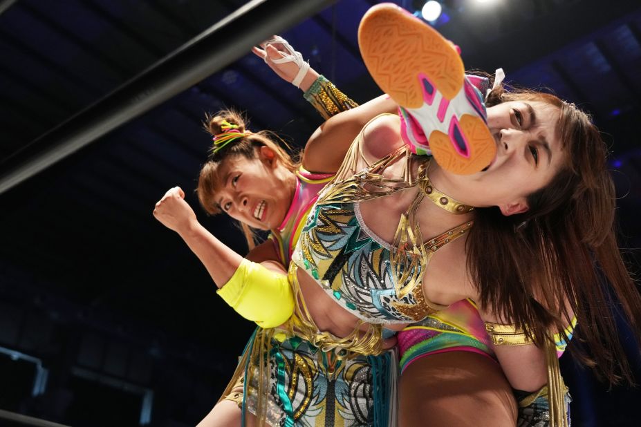 Pro wrestlers Fuwa-chan and Saya Kamitani face off during the "Stardom" event in Tokyo on Sunday, October 23.