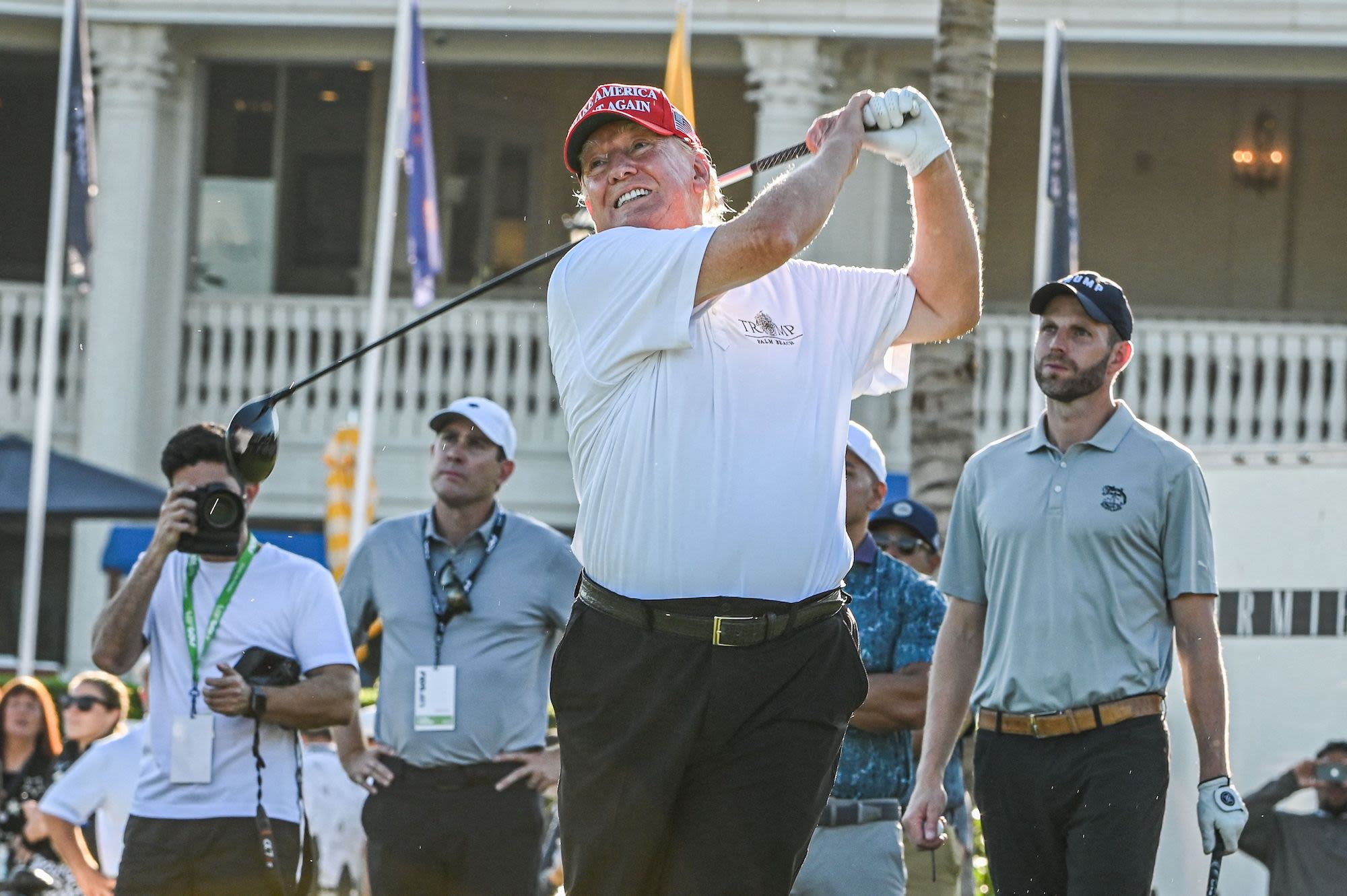 Former US President Donald Trump tees off at the Trump National Doral Golf Club in Miami on Thursday, October 27.