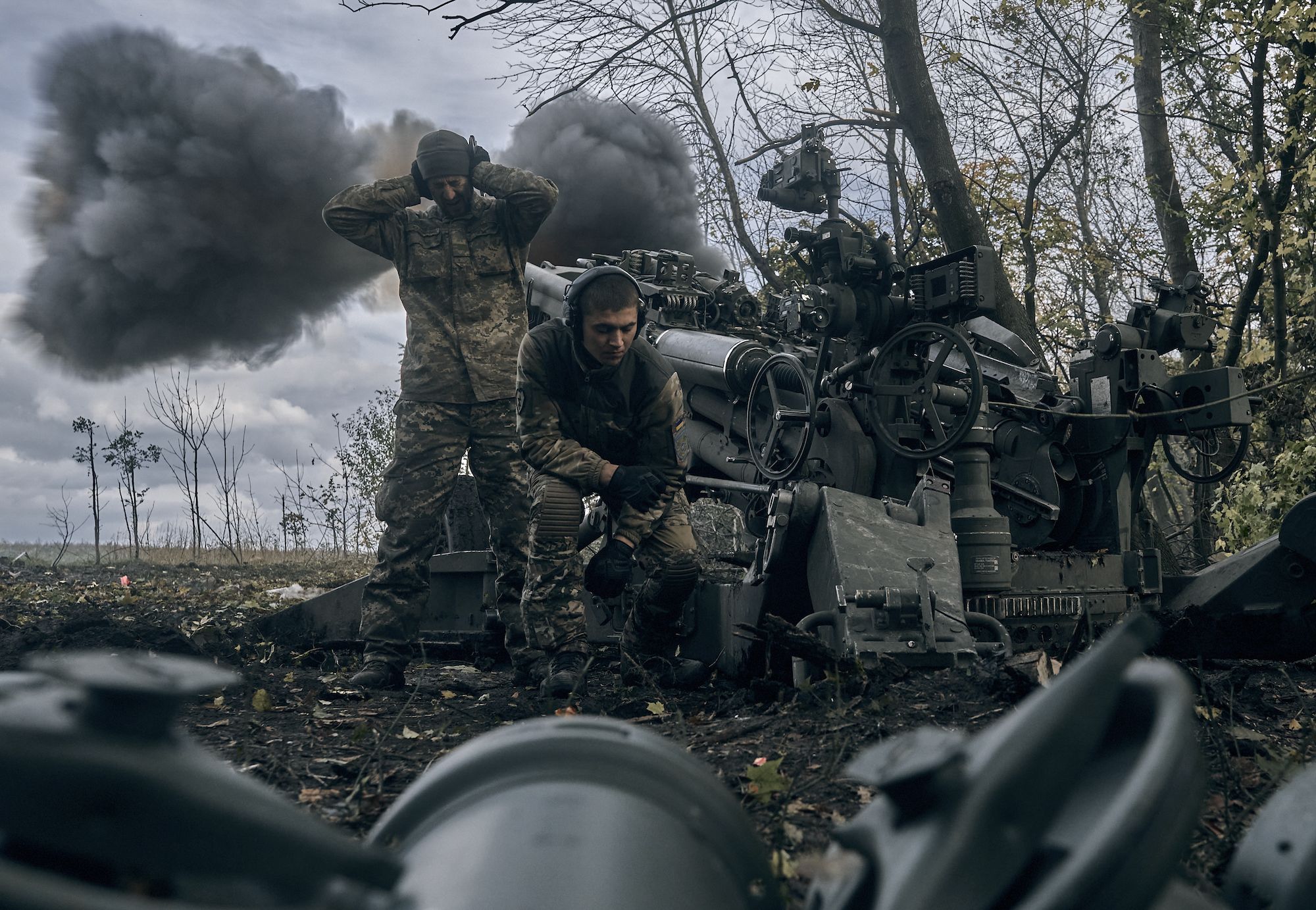 Ukrainian soldiers fire at Russian positions in eastern Ukraine using a US-supplied howitzer on Sunday, October 23.