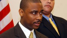 Clayton County Sheriff Victor Hill, left, is flanked by a member of his legal team attorney Rolf Jones, right, as he speaks during a Tuesday, Jan. 11, 2005, news conference in Jonesboro, Ga.  More than two dozen employees fired by Hill on his first day in office returned to work Thursday, Jan. 13, 2005, a day after they failed to obey an order to come in. 