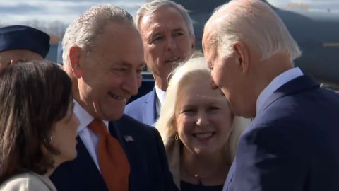 Senate Majority Leader Chuck Schumer, at left, speaks with President Joe Biden, at right, earlier this year.