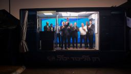 Former Israeli Prime Minster Benjamin Netanyahu speaks to supporters from a modified truck during a campaign event on October 6 in Hadera, Israel. 
