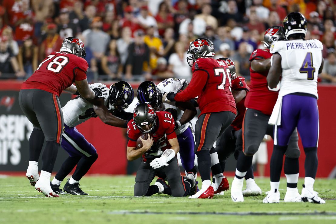 Justin Houston sacks Brady during the second quarter on Thursday. 