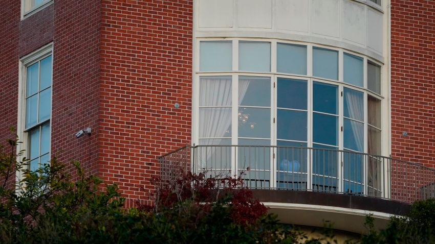 A heart shaped sculpture and a light on are seen inside a window of the home of Paul Pelosi, the husband of House Speaker Nancy Pelosi, in San Francisco, Friday, Oct. 28, 2022. Paul Pelosi, was attacked and severely beaten by an assailant with a hammer who broke into their San Francisco home early Friday, according to people familiar with the investigation. (AP Photo/Eric Risberg)