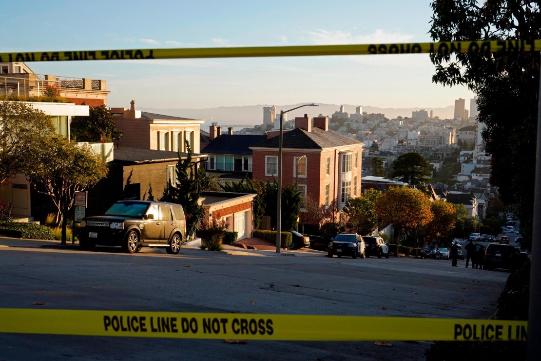 Police tape blocks a street outside the home of Paul Pelosi, the husband of House Speaker Nancy Pelosi, in San Francisco.