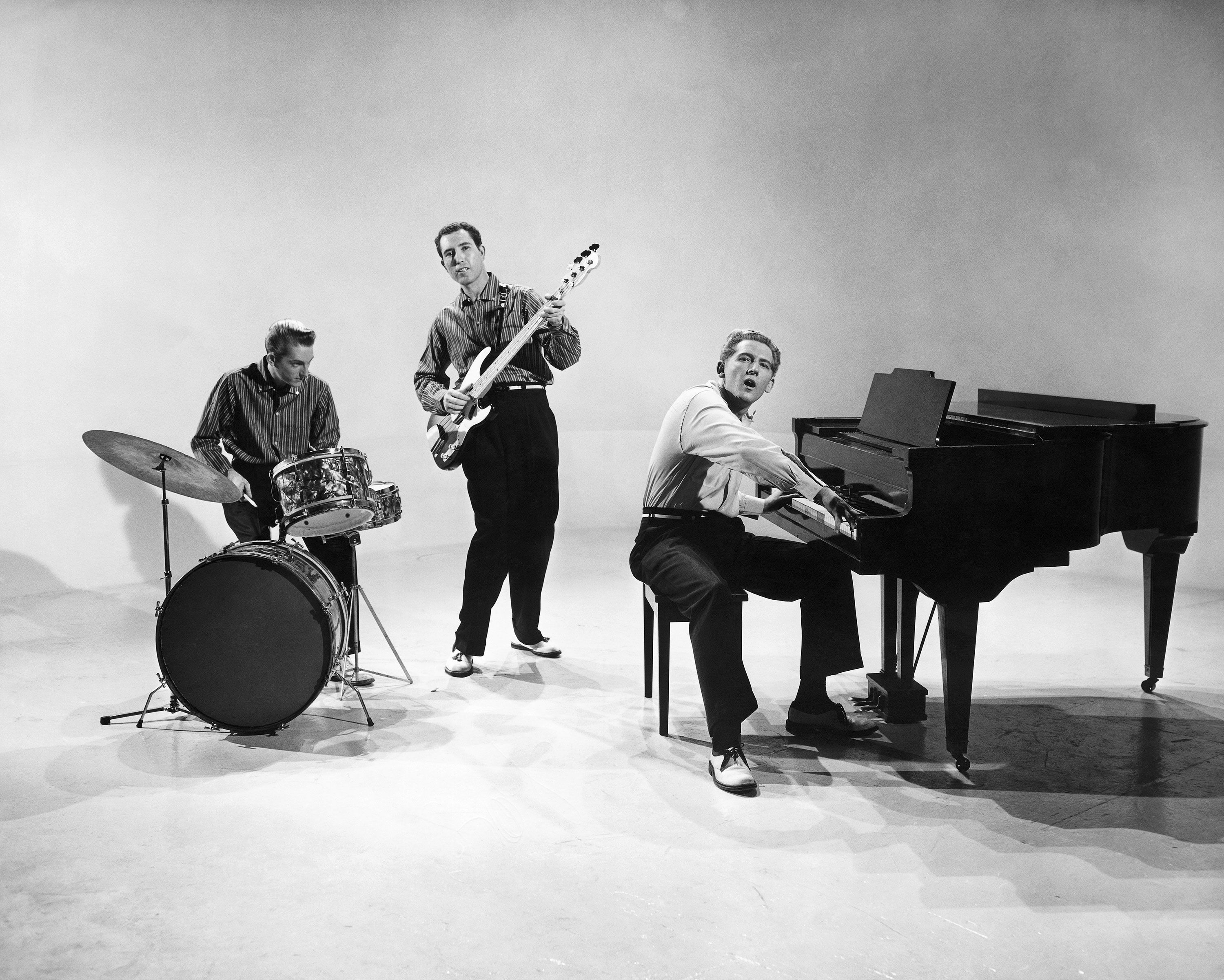 Lewis, right, performs in Memphis in 1957.