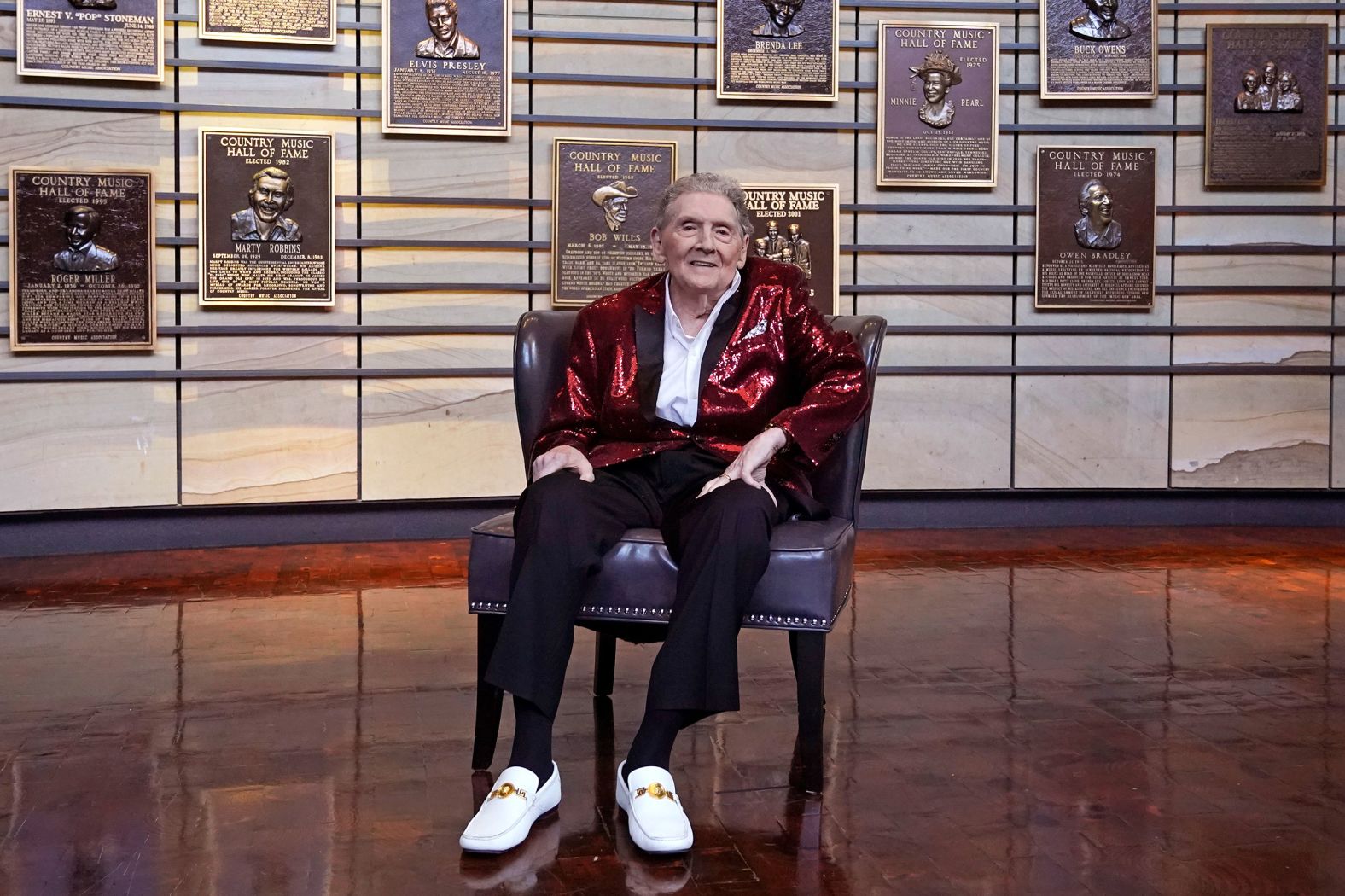 Lewis sits for a picture at the Country Music Hall of Fame after it was announced in May 2022 that he would be inducted as a member. He was unable to attend the ceremony in October because he was ill with the flu, according to a statement posted to his social media.