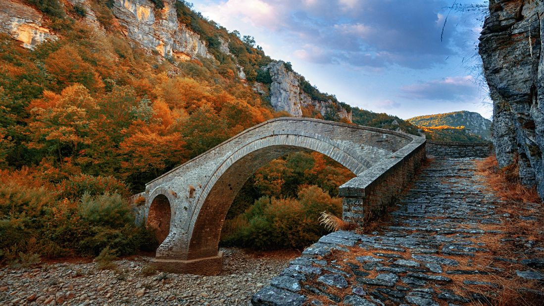 <strong>Zagori, Greece:</strong> A bridge connecting the villages of Vitsa and Koukouli spans the spectacular Vikos Gorge in this lesser-known area of mainland Greece.                
