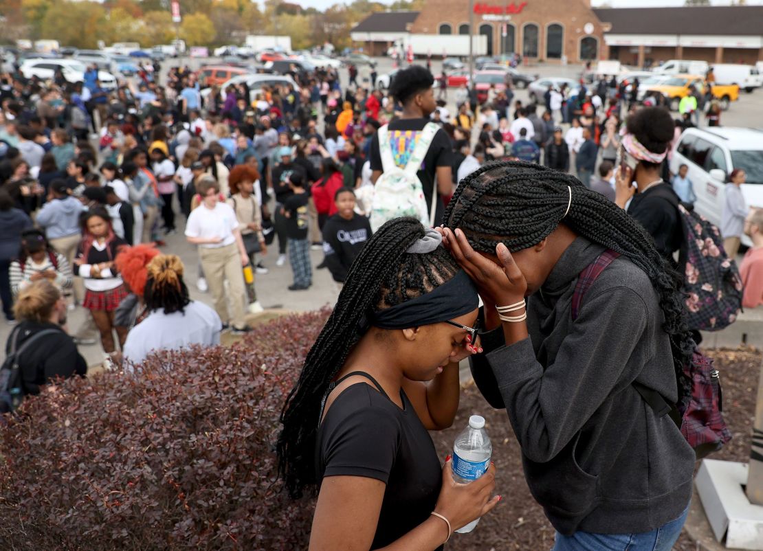 High School students were evacuated to a parking lot from the Central Visual & Performing Arts High School after a shooting on October 24, 2022 in St. Louis, Missouri. 