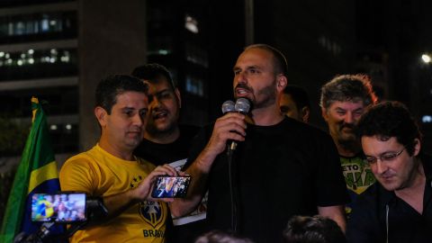 Lawmaker Eduardo Bolsonaro addresses a 'free speech rally' in São Paulo.