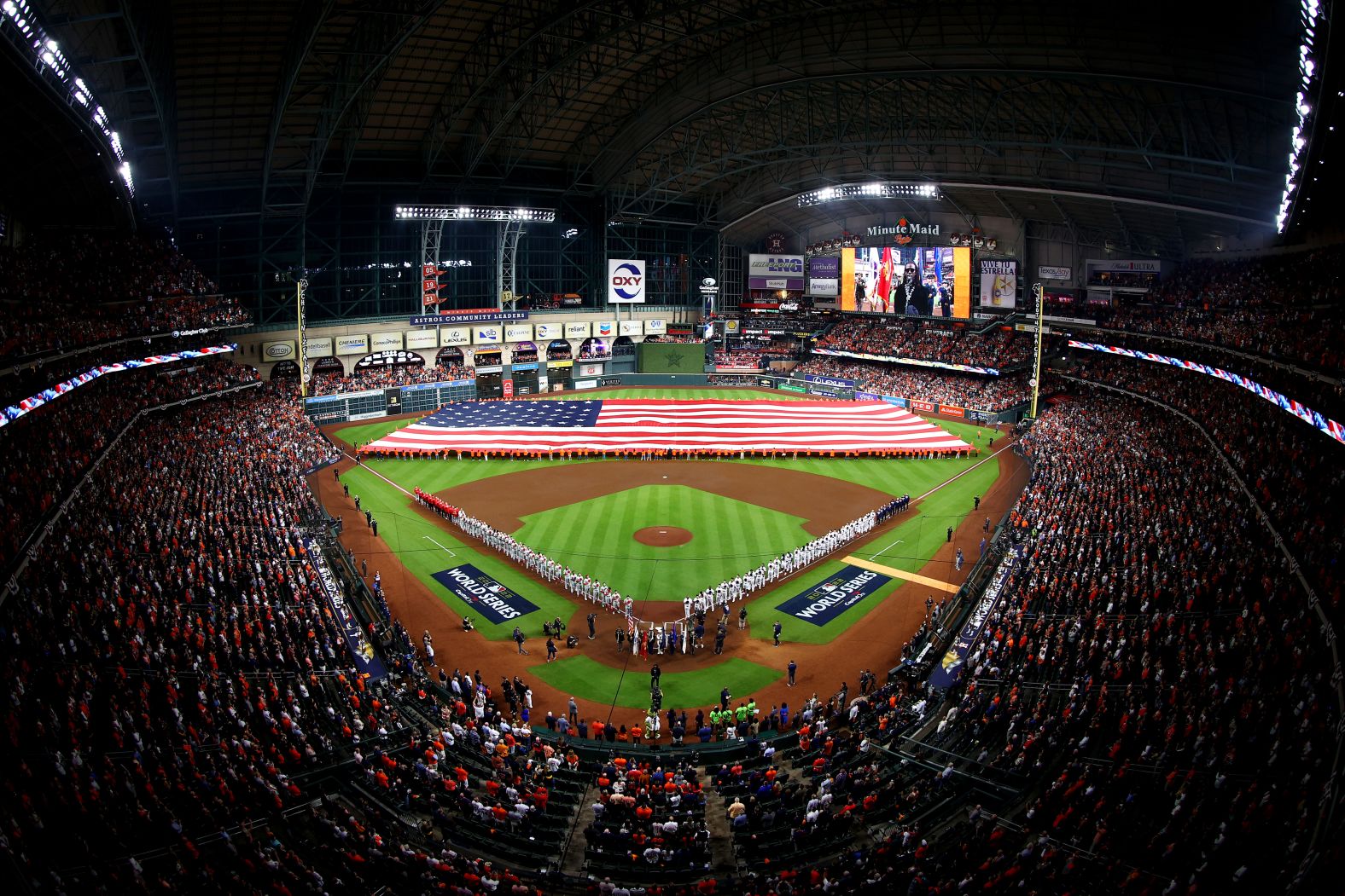 Teams line up for the National Anthem ahead of Game 1.