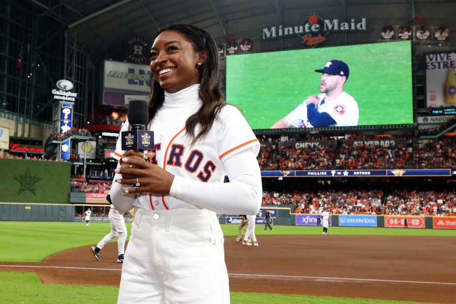 Olympic gymnast Simone Biles, who is from the Houston area, gives the "play ball" announcement before Game 1.