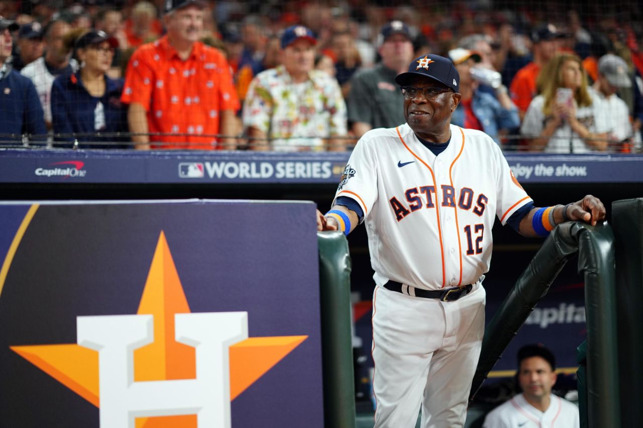Houston manager Dusty Baker watches from the dugout during Game 1's opening ceremony. The 73-year-old is the oldest manager in World Series history.