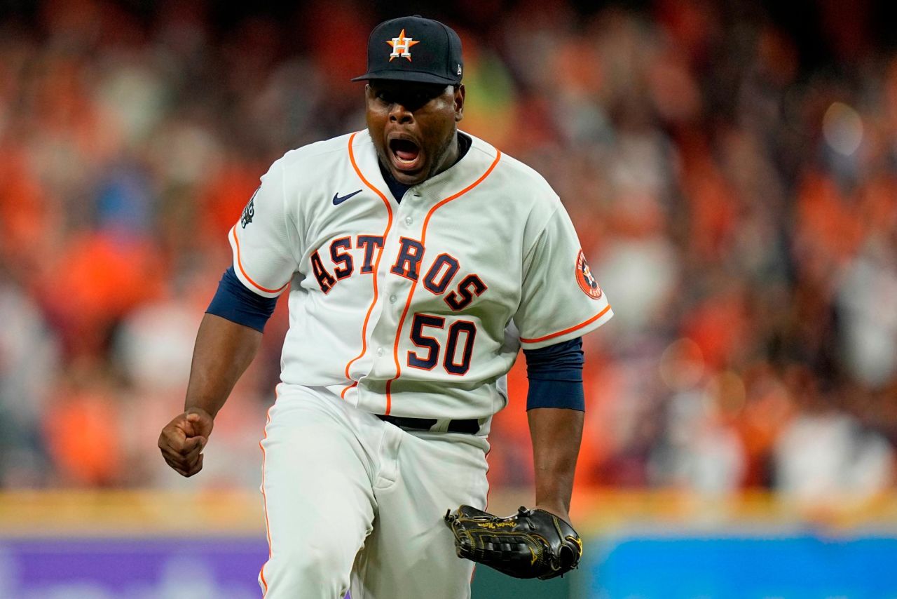 Houston relief pitcher Hector Neris celebrates after striking out Nick Castellanos to get out of a bases-loaded jam in the seventh inning Friday. The game was tied 5-5.