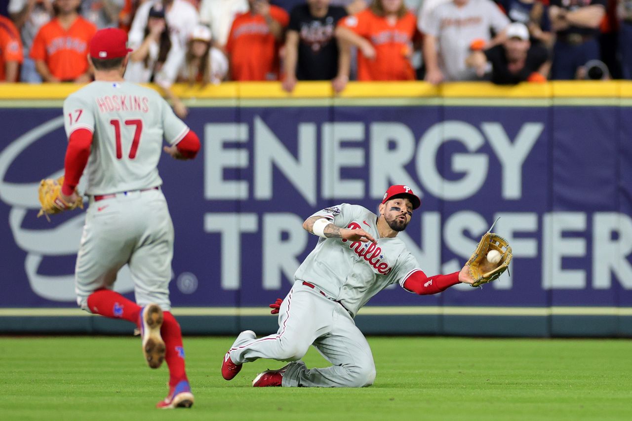 Phillies right fielder Nick Castellanos dives for a game-saving catch in the bottom of the ninth inning.
