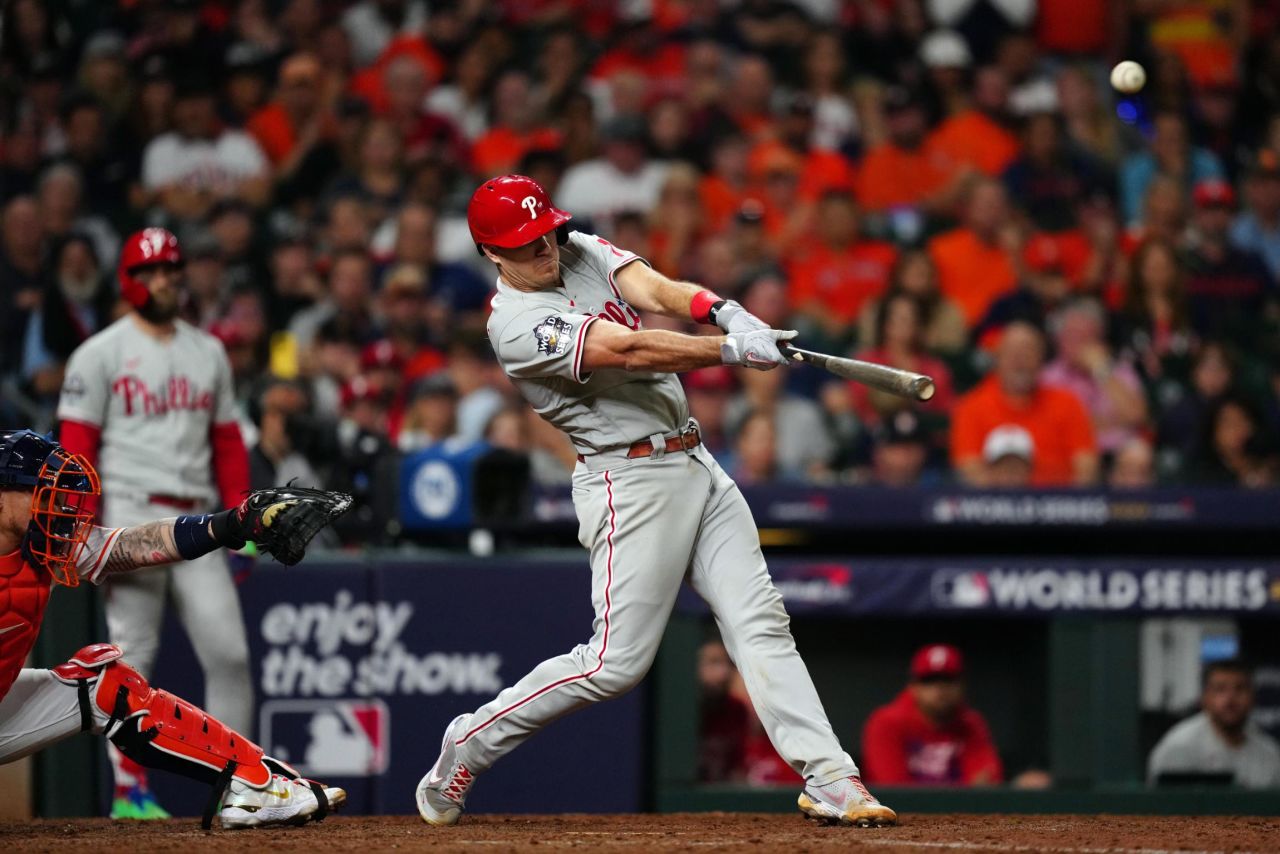 Philadelphia's J.T. Realmuto hits a solo home run in the top of the 10th inning to give the Phillies a 6-5 lead in Game 1 of the World Series on Friday, October 28. The Phillies went on to win by that score.