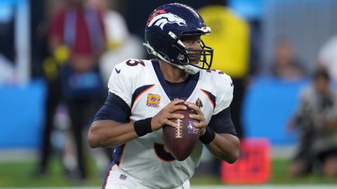 Russell Wilson throws the ball at the Los Angeles Chargers.