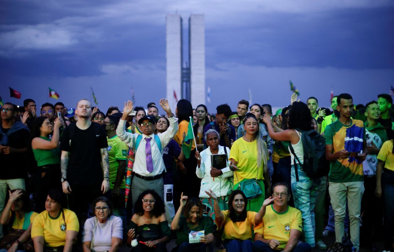Evangelical supporters of Bolsonaro attend a campaign rally in Brasilia on October 28. Brazilian evangelical voters have become a major point of contention for both candidates throughout the election.