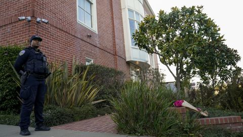 A police officer stands outside the home of Nancy and Paul Pelosi in San Francisco on October 28, 2022.