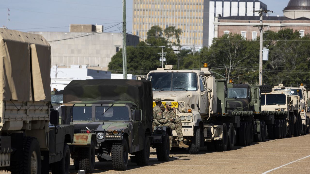 Personnel and equipment from the Mississippi National Guard organize in response to the water crisis on September 1 in Jackson, Mississippi. 