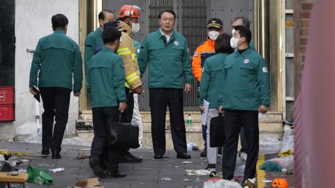 South Korean President Yoon Suk Yeol visits the scene in Seoul, South Korea, Sunday, Oct. 30, 2022.