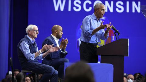 Obama speaks at a rally in Milwaukee on October 29, 2022, to support Wisconsin Gov. Tony Evers, left, and Democratic Senate nominee Mandela Barnes.