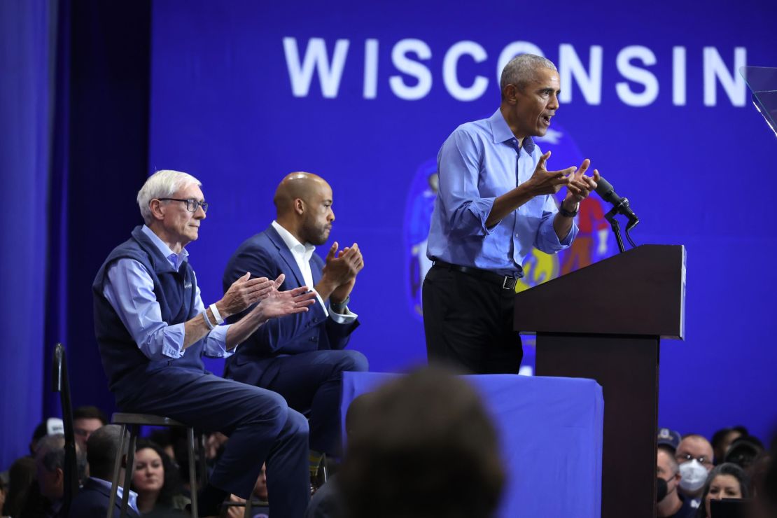 Obama speaks at a rally in Milwaukee on October 29, 2022, to support Wisconsin Gov. Tony Evers, left, and Democratic Senate nominee Mandela Barnes.