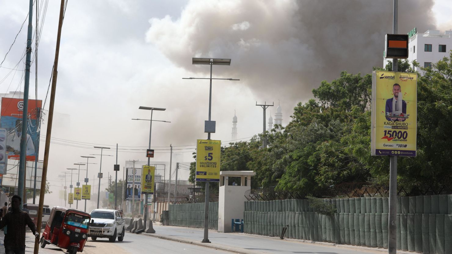 Smoke rises over Mogadishu after a large explosion near the education ministry in Mogadishu on October 29, 2022. 