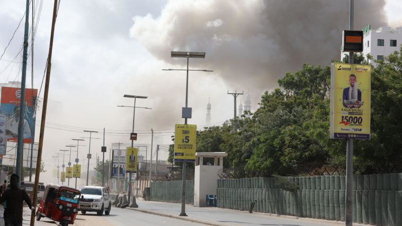 Explosions near Somalia’s education ministry kill 100 people | CNN