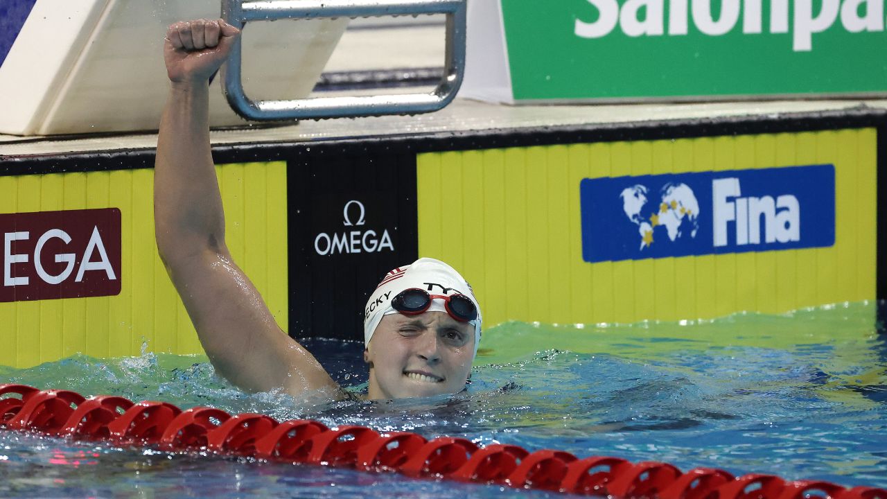 Katie Ledecky celebrates winning the 1500m freestyle in world record time.