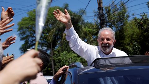 Brazil's former President and presidential candidate Luiz Inacio Lula da Silva greets his supporters as he leaves after casting his vote at a polling station, in Sao Bernardo do Campo, on the outskirts of Sao Paulo, Brazil October 30, 2022. 