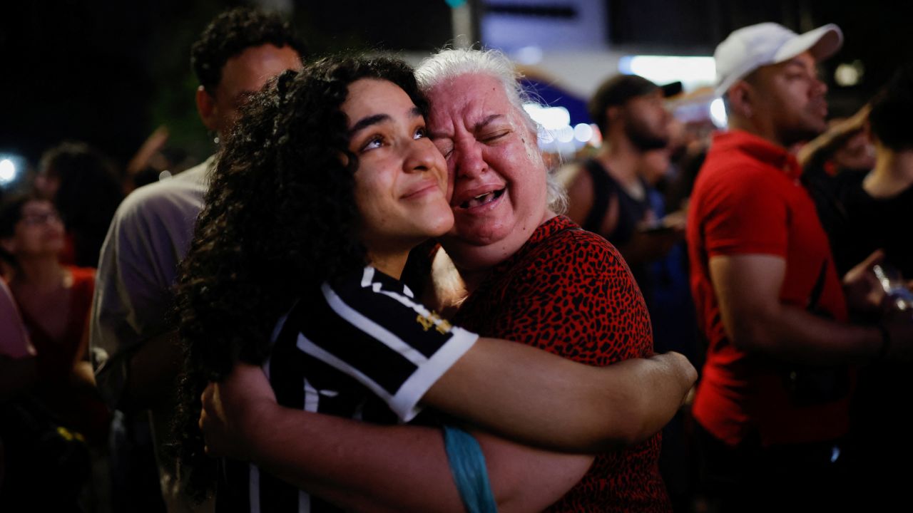 Supporters of Lula da Silva react as they wait for results at Paulista Avenue, Sao Paulo, Brazil, October 30, 2022.