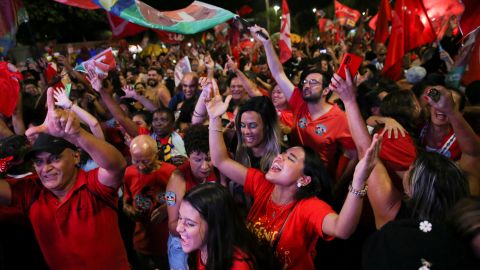 Supporters of Lula da Silva react as they gather on the day of the Brazilian presidential election run-off, in Brasilia, Brazil October 30, 2022.