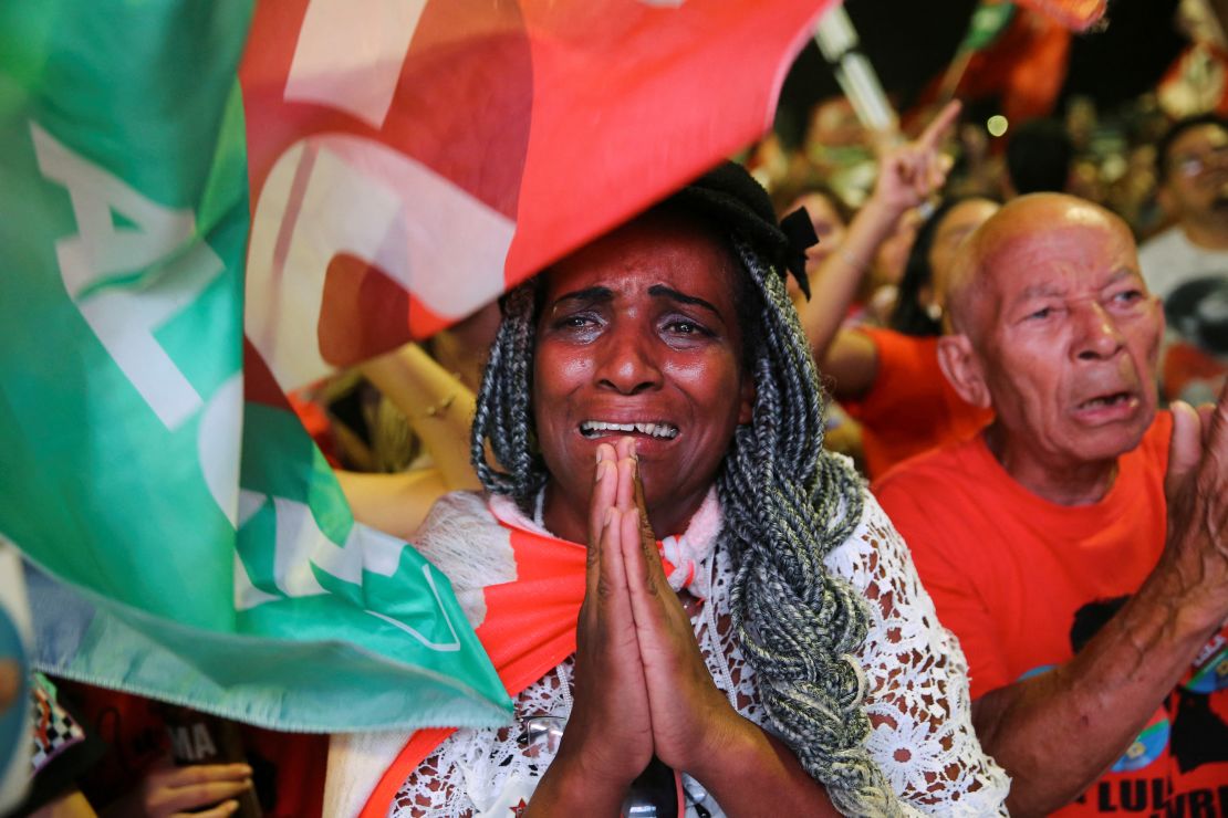 A supporter of Lula da Silva reacts while gathering with fellow supporters on the day of the Brazilian presidential election run-off, in Brasilia, Brazil October 30, 2022.