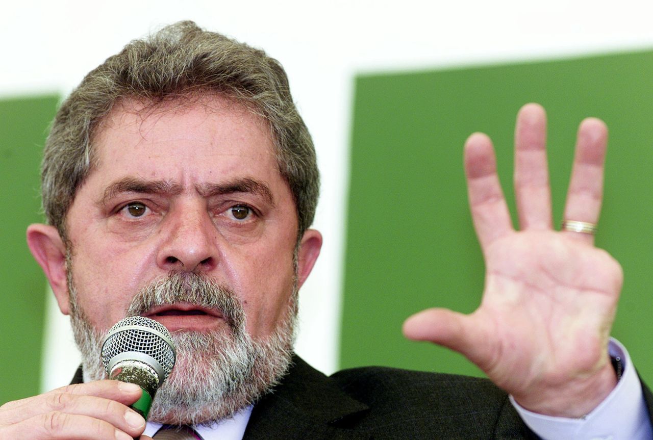 Lula speaks during debate with students and teachers at the University of Brasília in 2002. He lost his left pinky finger at the age of 19 while working in an automobile parts factory.