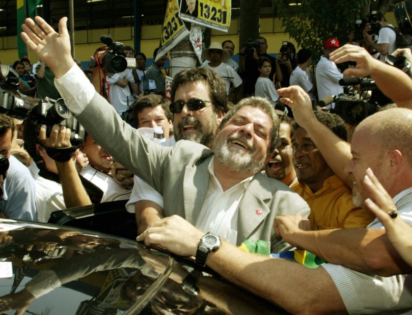 Lula waves to supporters after casting his ballot in his hometown of São Bernardo do Campo in 2002. This was Lula's second presidential run where he would go on to win with 61.3% of the vote.