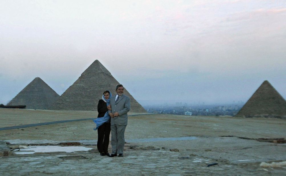 Lula and his wife Marisa pose for a picture in front of Egypt's pyramids in Giza in 2003.