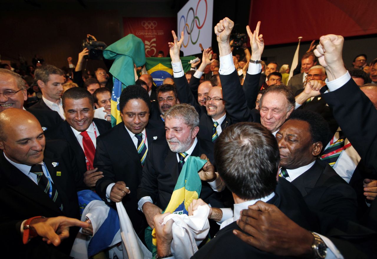 Lula celebrates with members of the Brazilian Olympic delegation, including football legend Pele, in Copenhagen in 2009 after it was announced that Rio de Janeiro had won the bid to host the 2016 Summer Olympic Games.<br />