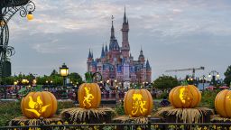 SHANGHAI, CHINA - SEPTEMBER 23: Pumpkin lanterns are illuminated at Shanghai Disneyland to welcome the upcoming Halloween on September 23, 2022 in Shanghai, China. (Photo by VCG/VCG via Getty Images)