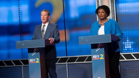 Republican Georgia Gov. Brian Kemp, left, and Democratic challenger Stacey Abrams face off in a televised debate, in Atlanta, Sunday, Oct. 30, 2022. 