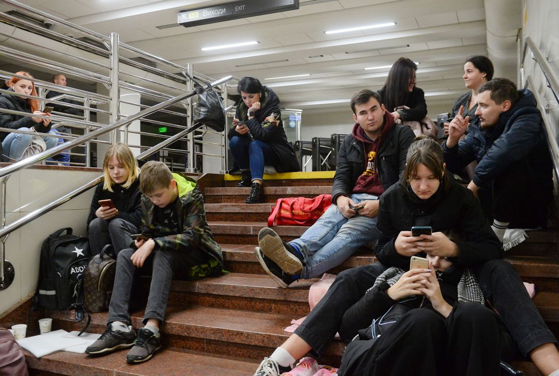 Ukrainians shelter inside a metro station after a missile attack in Kyiv on Monday.