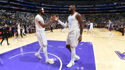 LOS ANGELES, CA - OCTOBER 30: LeBron James #6 and Anthony Davis #3 of the Los Angeles Lakers high five after the game against the Denver Nuggets on October 30, 2022 at Crypto.Com Arena in Los Angeles, California. NOTE TO USER: User expressly acknowledges and agrees that, by downloading and/or using this Photograph, user is consenting to the terms and conditions of the Getty Images License Agreement. Mandatory Copyright Notice: Copyright 2022 NBAE (Photo by Andrew D. Bernstein/NBAE via Getty Images)