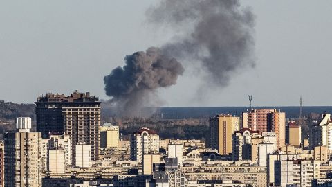 Smoke rises on the outskirts of Kyiv during a Russian missile attack.