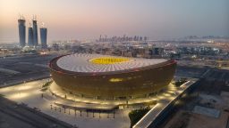 DOHA, QATAR - JUNE 20: (EDITORS NOTE: This photograph was taken using a drone) An aerial view of Lusail Stadium at sunrise on June 20, 2022 in Doha, Qatar. The 80,000-seat stadium, designed by Foster + Partners studio, will host the final game of the FIFA World Cup Qatar 2022 starting in November. (Photo by David Ramos/Getty Images)
