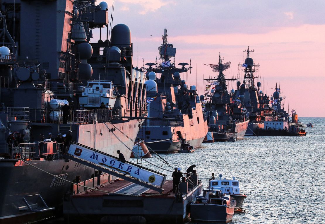 Russian warships are seen ahead of the Navy Day parade in the Black Sea port of Sevastopol, Crimea, on July 23, 2021.