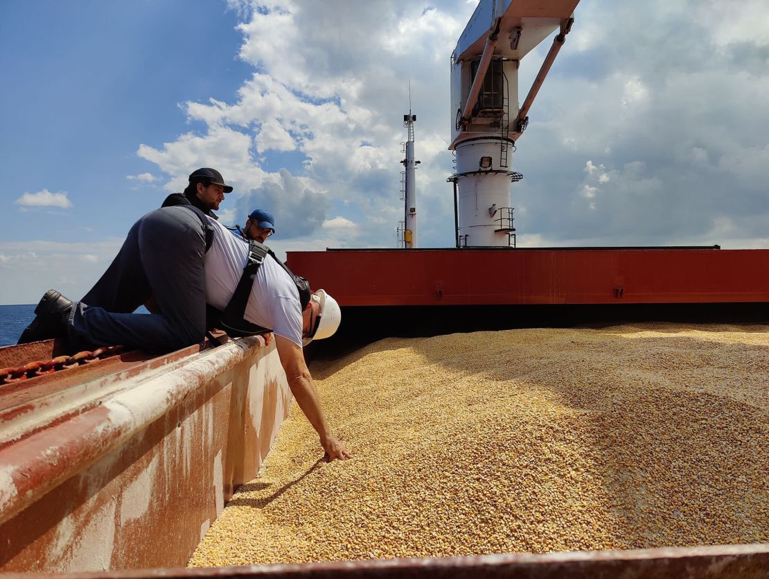 Representatives of Russia, Ukraine, Turkey and the United Nations inspect the ship Razoni, which left Odesa loaded with corn and anchored by the Bosphorus Strait in Istanbul, Turkey, on August 3, 2022.
