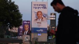 A picture shows a electoral banner for the Likud party depicting its leader former prime minister Benjamin Netanyahu, under a slogan which reads in Hebrew "the 61st mandate depends only on your" in Tel Aviv on October 27, 2022, ahead of the November general elections. 