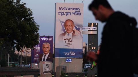 Pictured is a campaign banner for the Likud party showing Netanyahu in Tel Aviv on October 27.